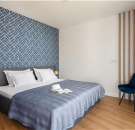 Luxury Beachfront Villa with Heated Infinity Pool near Trogir, Sleeps 8